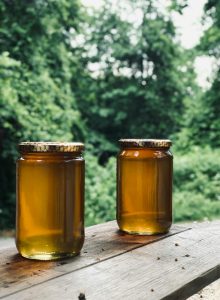 When can I harvest honey from my hives?